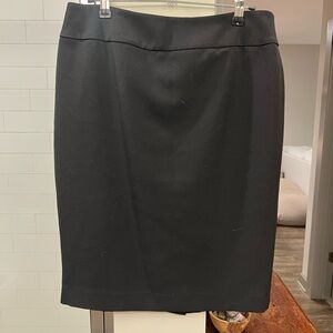 Black knee-length skirt
